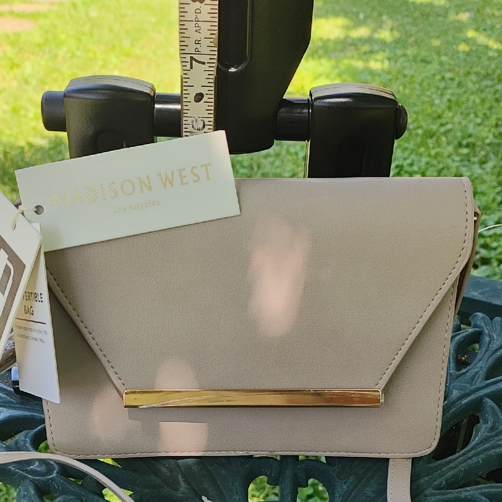 Madison West Tan Clutch with Elegant Metallic Accent